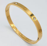 Radiant Sunburst Studded Golden Wrist Bangle
