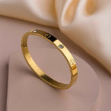 Radiant Sunburst Studded Golden Wrist Bangle