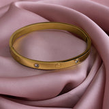 Radiant Sunburst Studded Golden Wrist Bangle